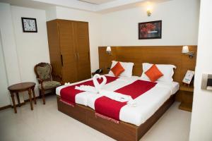 Postel nebo postele na pokoji v ubytování Moskva Hotel
