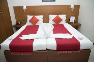 Postel nebo postele na pokoji v ubytování Moskva Hotel