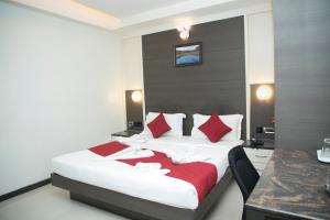 Postel nebo postele na pokoji v ubytování Moskva Hotel