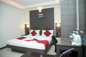 Postel nebo postele na pokoji v ubytování Moskva Hotel