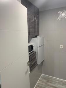 A kitchen or kitchenette at Apartamento La Campanina