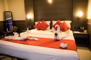 Postel nebo postele na pokoji v ubytování Moskva Hotel