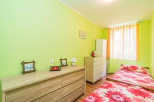 Posteľ alebo postele v izbe v ubytovaní Apartment Runko in Villa Emilia