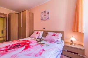 Posteľ alebo postele v izbe v ubytovaní Apartment Runko in Villa Emilia