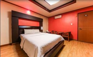 Postel nebo postele na pokoji v ubytování Prince Hotel