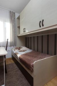 En eller flere senger på et rom på Villa Bozena
