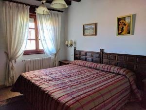 Postel nebo postele na pokoji v ubytování Posada La Merced