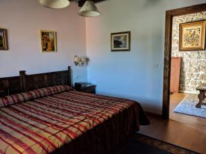 Postel nebo postele na pokoji v ubytování Posada La Merced