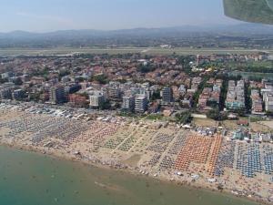an aerial view of a beach and buildings at Hotel Tiziana in Rimini