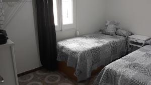 Кровать или кровати в номере loft turistic
