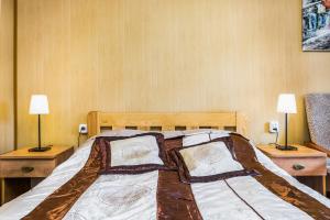 Postel nebo postele na pokoji v ubytování Dom Gościnny Marcela