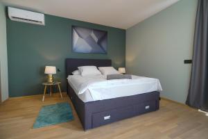 Posteľ alebo postele v izbe v ubytovaní Villa Terrazza + 28 fotografií