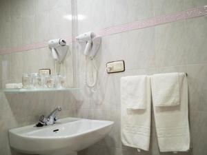 Koupelna v ubytování Hotel Quino