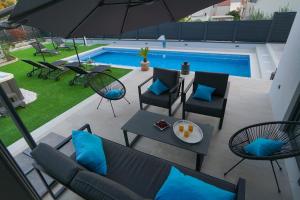 Bazén v ubytovaní Villa Terrazza alebo v jeho blízkosti