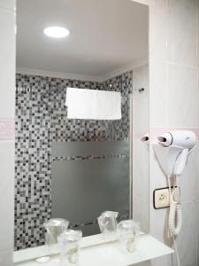 Koupelna v ubytování Hotel Quino