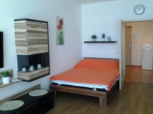 Кровать или кровати в номере Apartmán Residence Nábřeží