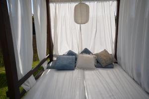Posteľ alebo postele v izbe v ubytovaní Hotel Cachada