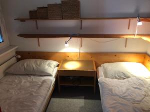 Postel nebo postele na pokoji v ubytování Haus Wogesa - Ruth