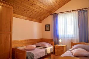 Postel nebo postele na pokoji v ubytování Apartment Zen