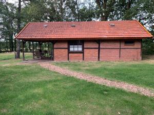 Fotografie z fotogalerie ubytování Ferienhaus am Wäldchen v destinaci Uelsen