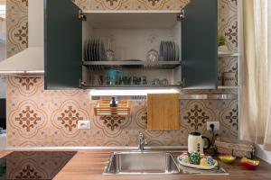A kitchen or kitchenette at David Pretty Loft near Central Station Casatuabari