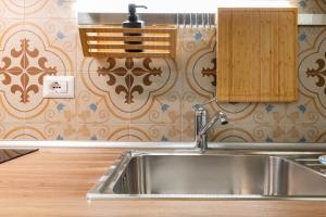 A kitchen or kitchenette at David Pretty Loft near Central Station Casatuabari