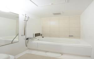 Koupelna v ubytování Dormy Inn Express Matsue + 16 fotografií