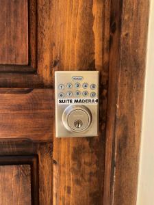 a close up of a door with a safe marker on it at Magnolias Boutique Suites & SPA in San Cristóbal de Las Casas