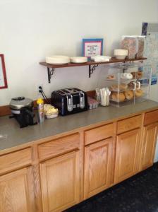 a counter with some food on top of it at Coeur D' Alene Budget Saver Motel in Coeur d'Alene