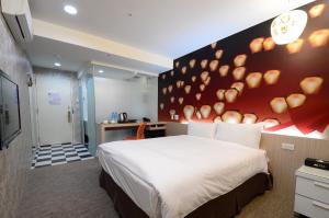 Кровать или кровати в номере Morwing Hotel Fuzhong