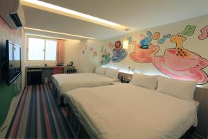 Ένα ή περισσότερα κρεβάτια σε δωμάτιο στο Morwing Hotel Fuzhong