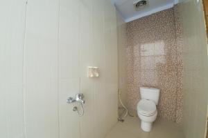 Ванна кімната в RedDoorz Plus Syariah @ Pentadio Gorontalo