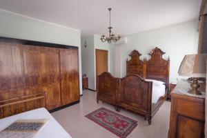 Postel nebo postele na pokoji v ubytování AgriB&B Corte Burchio