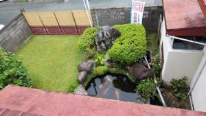 Taman di luar Walking Pilgrimage Hotel Tokiwa Ryokan