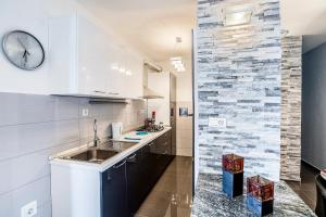Kuchyň nebo kuchyňský kout v ubytování Apartment Gordan