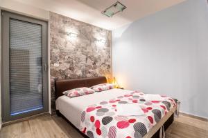 Postel nebo postele na pokoji v ubytování Apartment Gordan