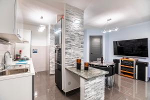 Kuchyň nebo kuchyňský kout v ubytování Apartment Gordan