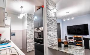 Kuchyň nebo kuchyňský kout v ubytování Apartment Gordan