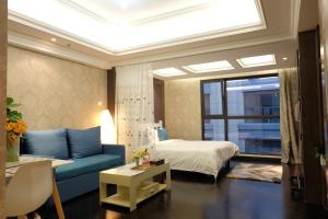 Tempat tidur dalam kamar di Ring Service Apartment 798 Art Zone