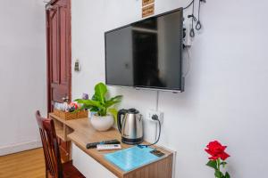 TV a/nebo společenská místnost v ubytování H79 HOTEL