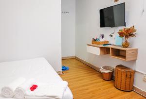 Postel nebo postele na pokoji v ubytování H79 HOTEL