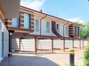 a house with a fence in front of it at Emotional Grand Motel in Fontaneto dʼAgogna