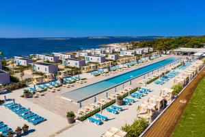an aerial view of a resort with a swimming pool at Arena Grand Kazela Camping Homes in Medulin