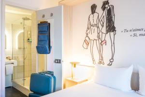 Postel nebo postele na pokoji v ubytování ibis Styles Sceaux Paris Sud