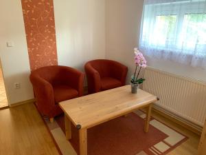 Posedenie v ubytovaní Vila Linda