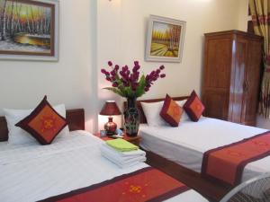 Katil atau katil-katil dalam bilik di Hanoi Ecogreen Hostel