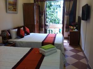 Katil atau katil-katil dalam bilik di Hanoi Ecogreen Hostel