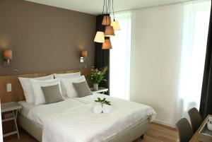 Letto o letti in una camera di Berdorfer Eck - Bed&Breakfast