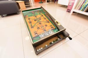 a game in a box on the floor in a store at 曉翠軒親子民宿 in Wujie