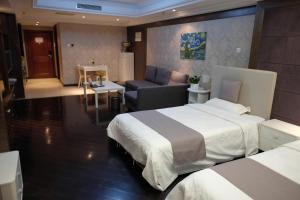 Tempat tidur dalam kamar di Ring Service Apartment 798 Art Zone